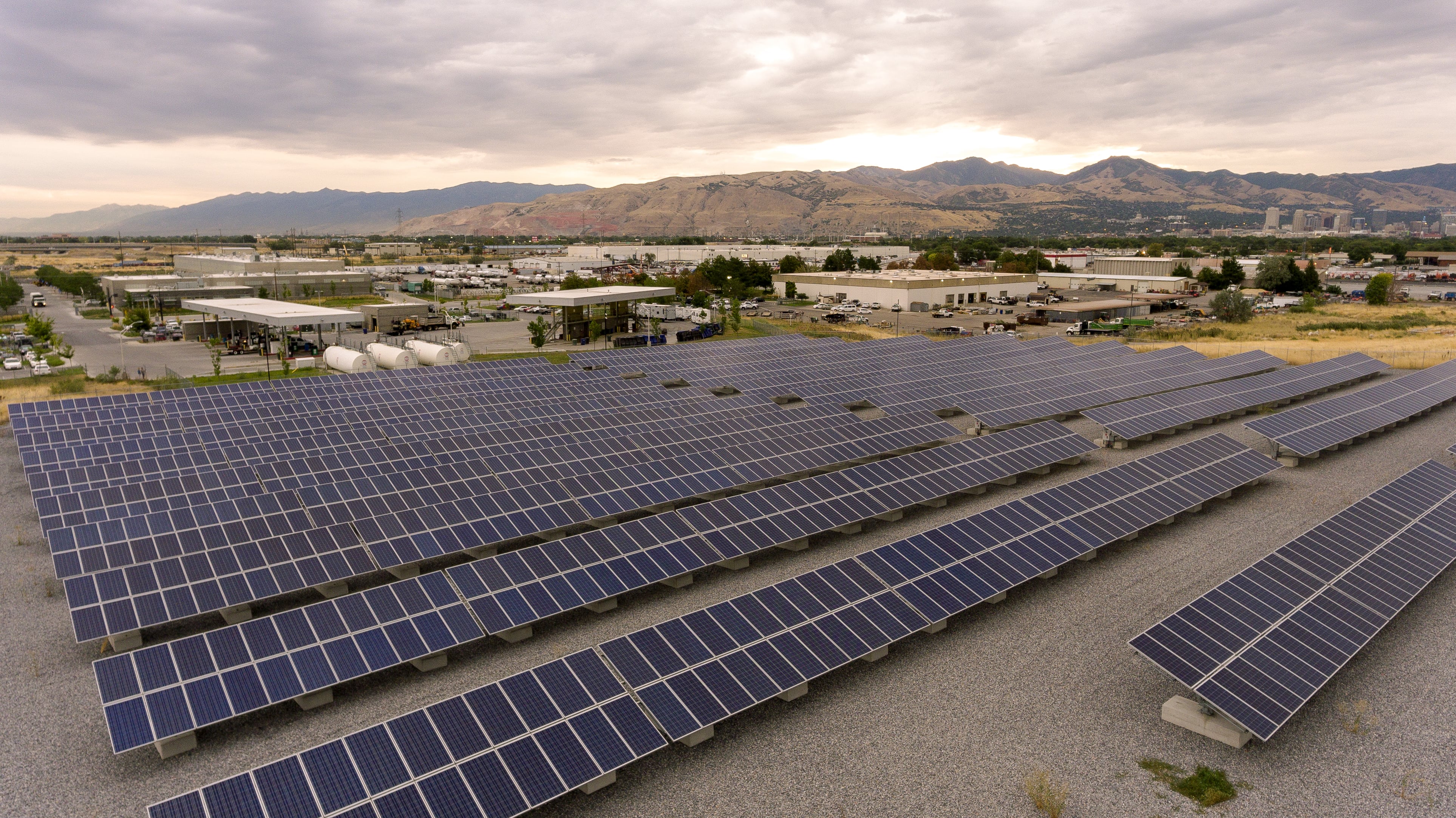 Photo of Salt lake City's solar farm near Fleet Department. Photo taken looking north east across Salt Lake City towards mountains. 