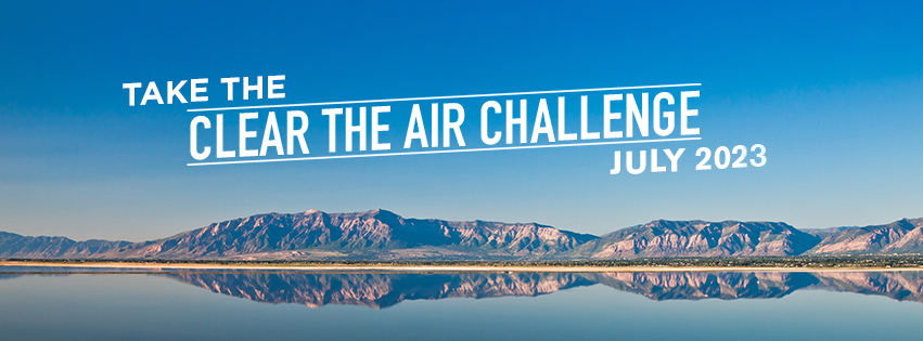 Graphic reads: Take the Clear The Air Challenge July 2023 with a graphic of a mountain range and a clear blue sky